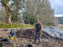 Covered, treated manure